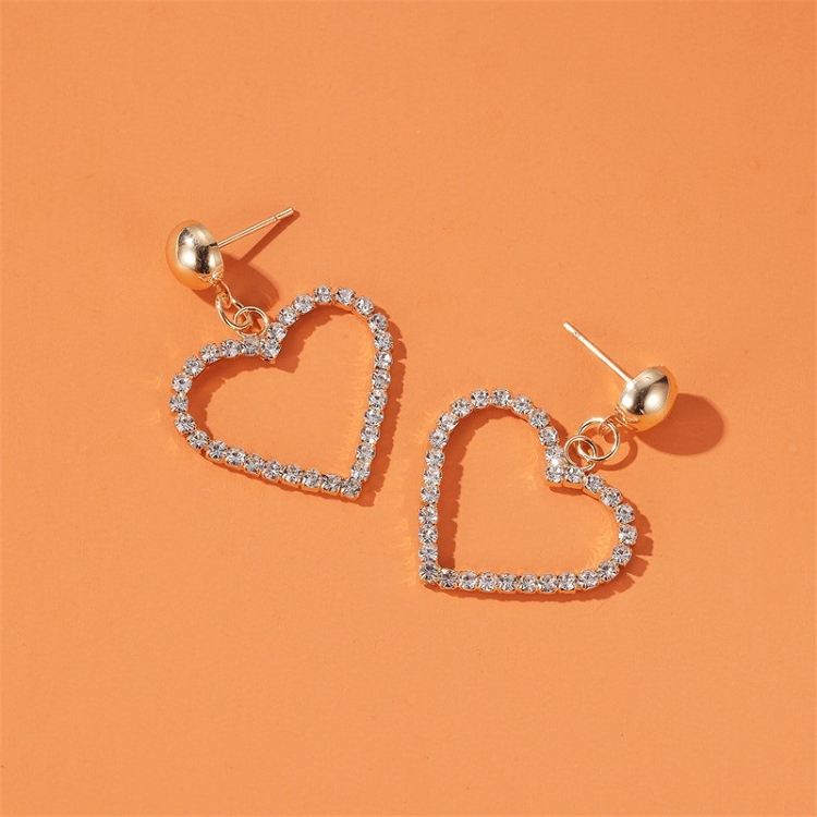 Korean simple love earrings pure girl heart set diamond heart earrings net red sweet heart hollow earrings ?